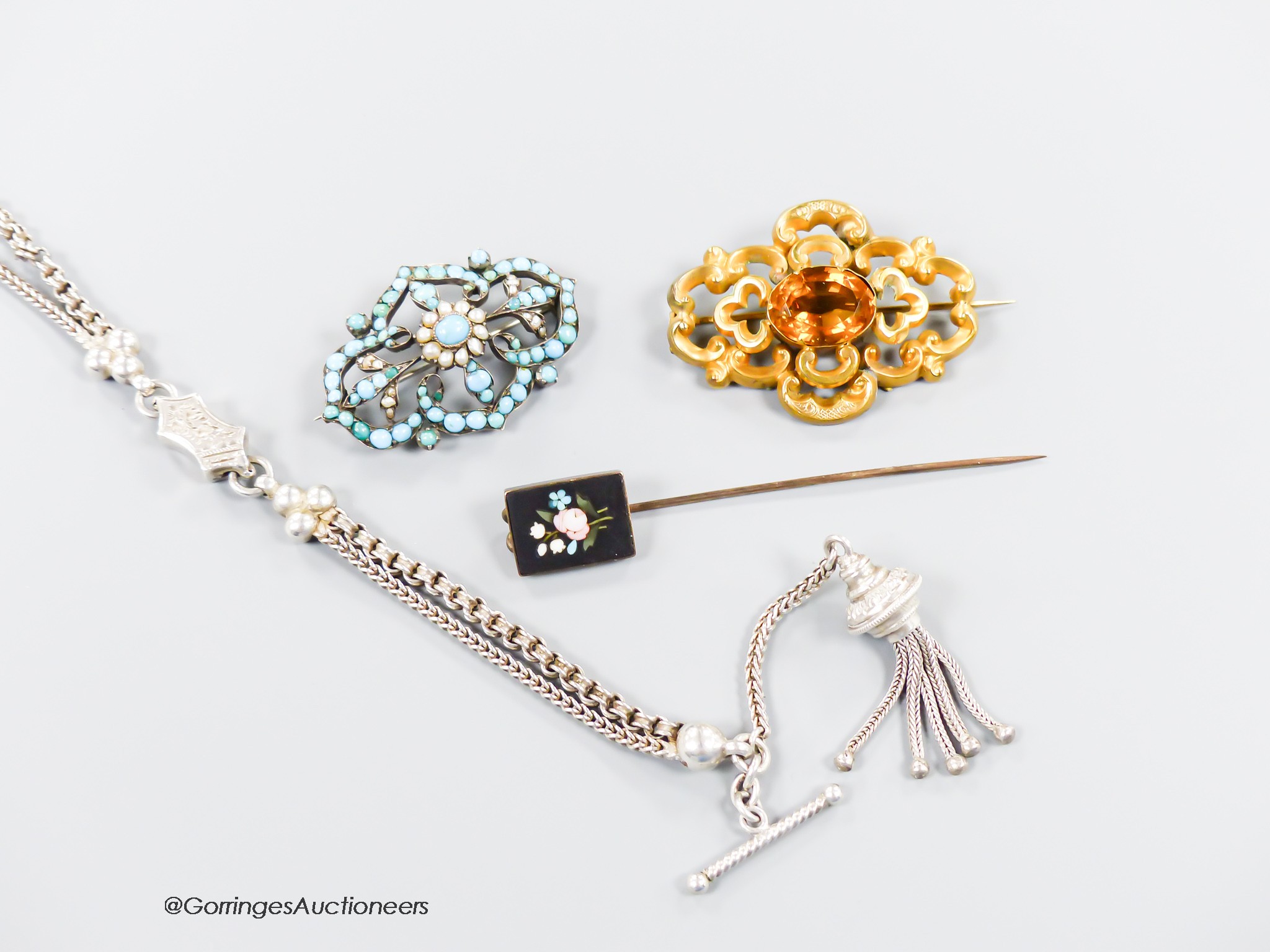 A George V silver albertina, 27cm, an Edwardian yellow metal and citrine brooch, a turquoise and seed pearl brooch and a yellow metal and pietra dura set stick pin.